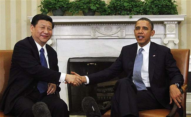 Xi Jinping dan Obama (REUTERS/Jason Reed)