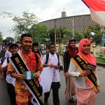 Wakil Agam dan Inong Aceh Besar mengikuti pawai acara #2612CareDay di Banda Aceh (Foto M Iqbal/SeputarAceh.com)